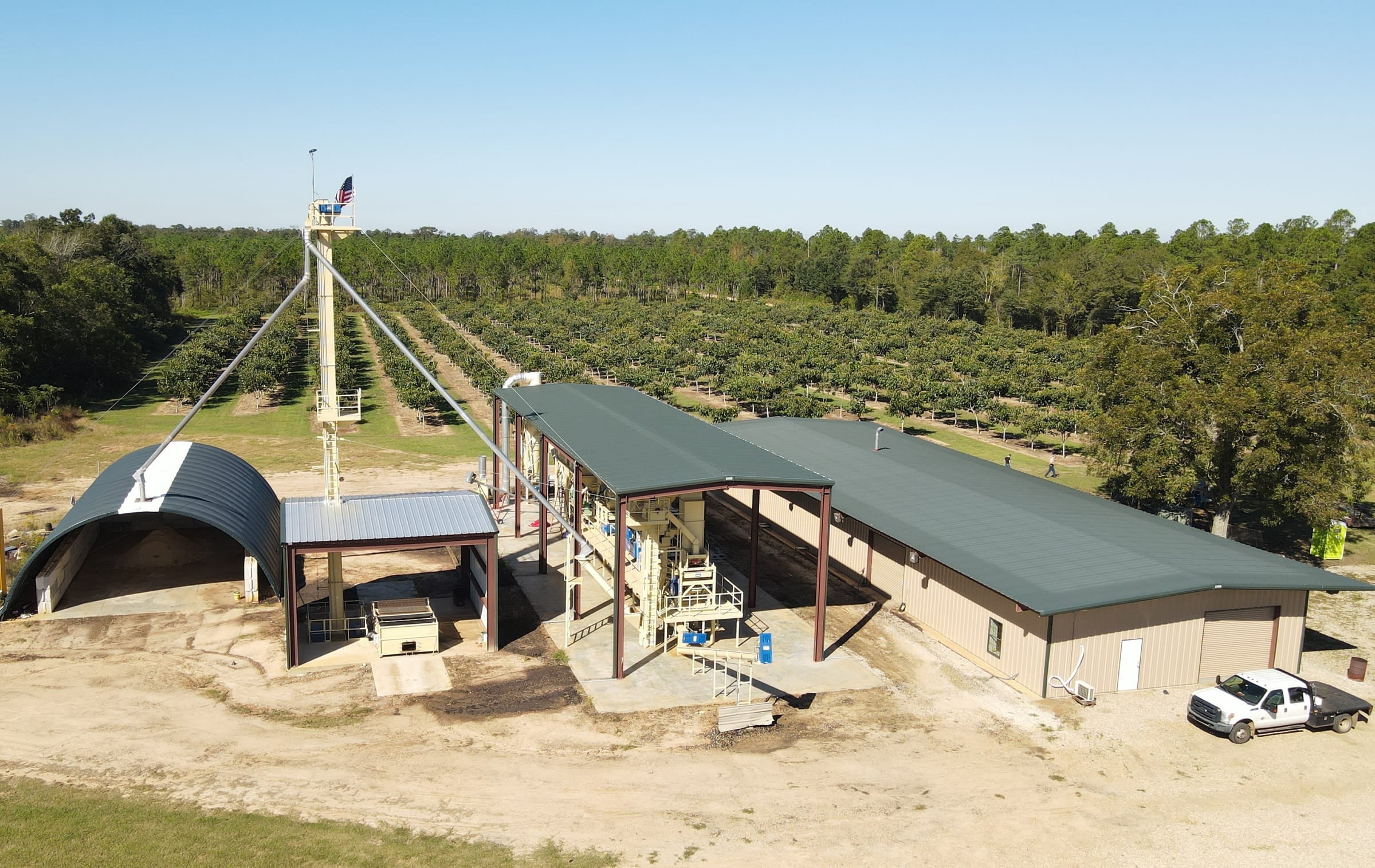 The mill buildings and the surrounding orchard, seen from the air