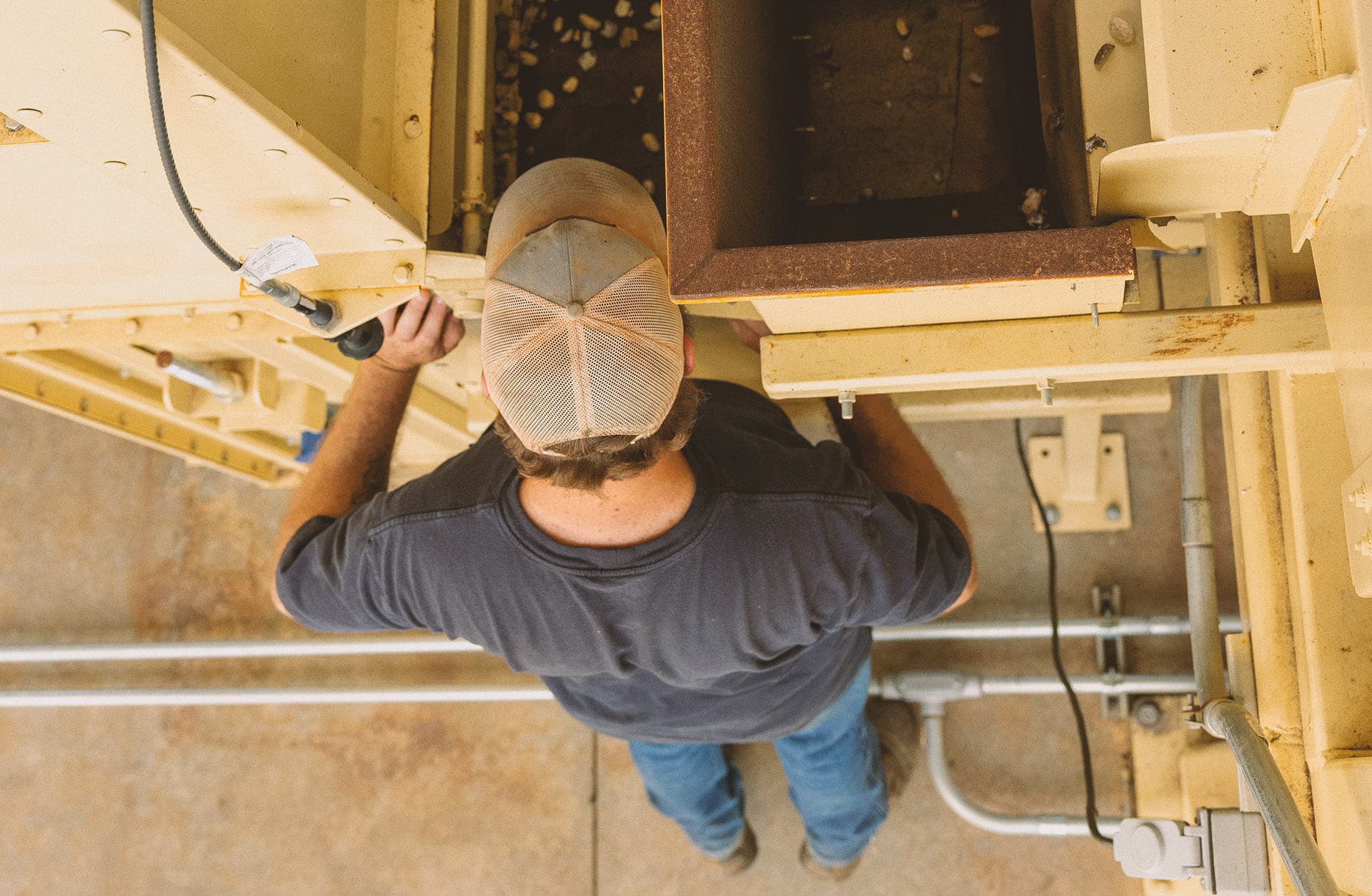 An operator at the mill, from above.