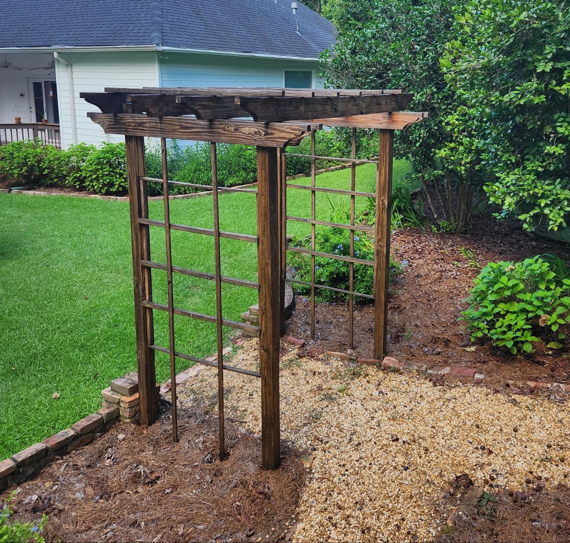 White log structure and sinker cypress gate